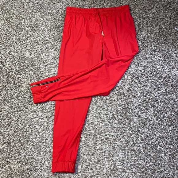 ZYIA Pants - Red Everywhere Zipper Joggers